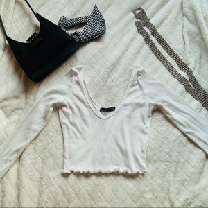 white low-cut long sleeve crop top